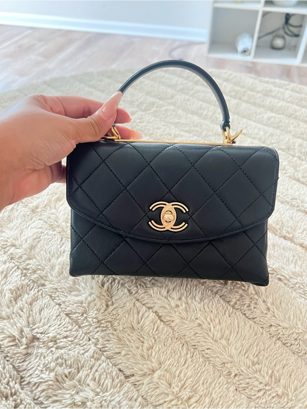 CHANEL Black Quilted Mini Top Handle Bag with Gold CC Lock